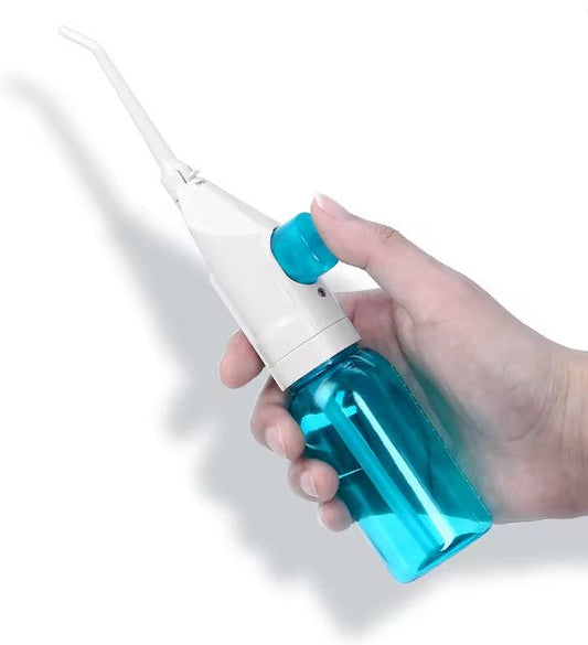 Oral irrigator, water toothpick, manual pump mouth cleaner
